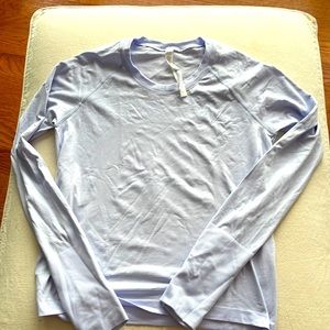 Lulu lemon shirt . Lilac never worn size 10